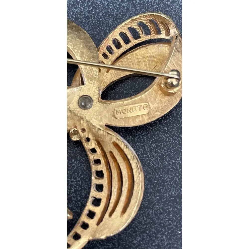 Vintage MONET Gold Tone, White Enamel Fancy Bow Design Brooch Stamped